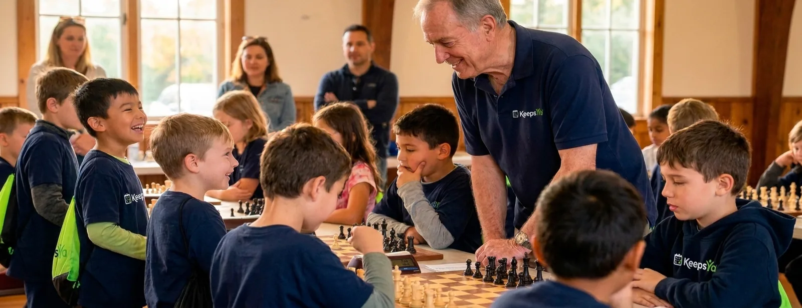 A coach running chess with their players on KeepsYa
