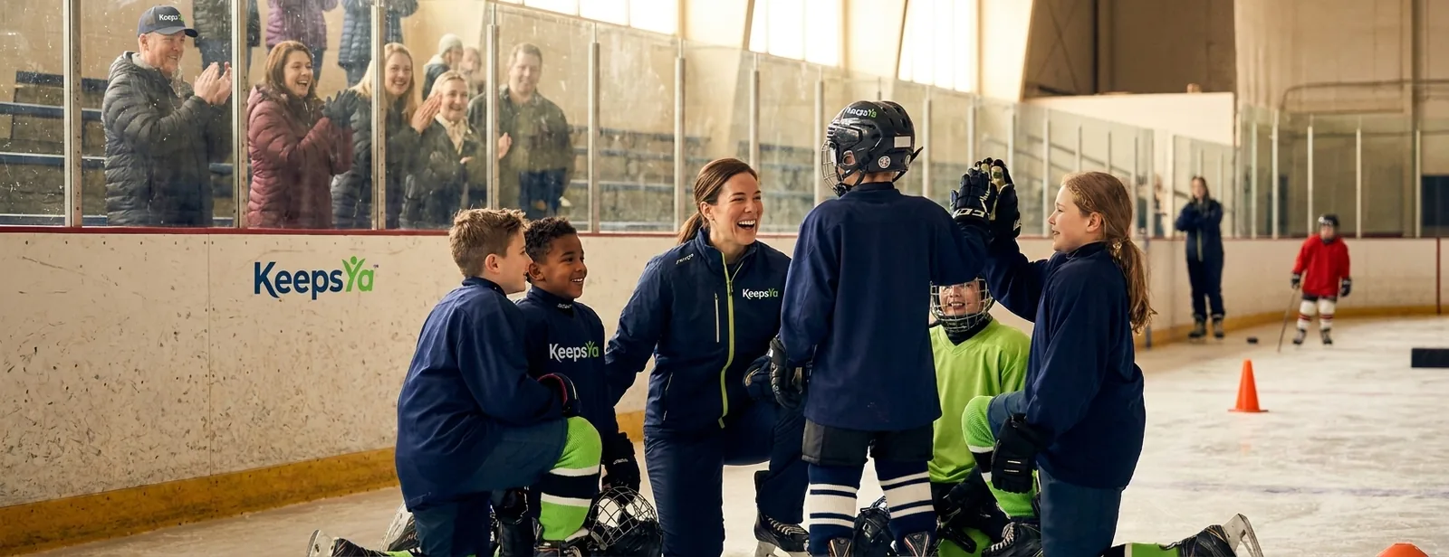 A coach running ice hockey with their players on KeepsYa